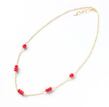 red coral delicate gold necklace